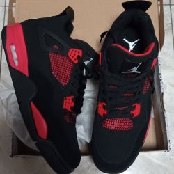 Red Thunder Jordan 4s 
