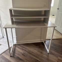 Table And Bookshelves