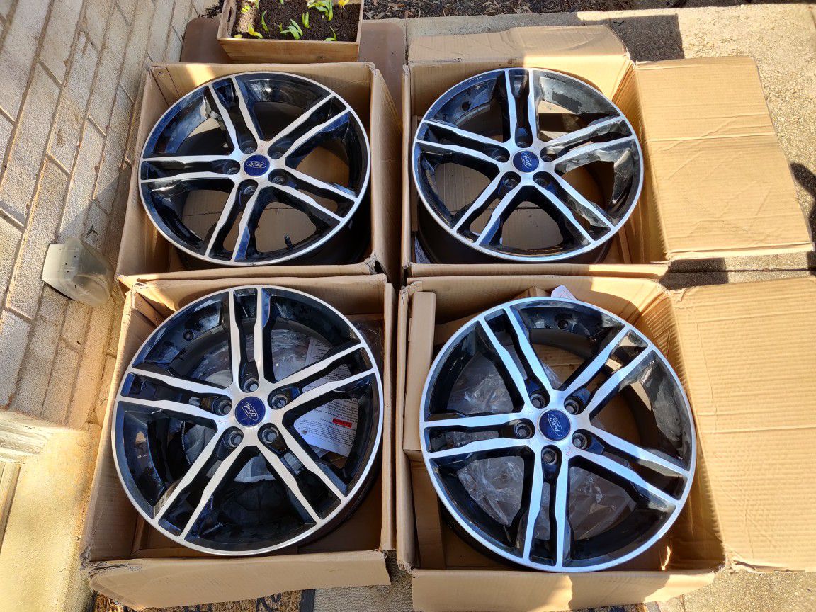 Ford rims. Brand New. Perfect condition. 18'. See pics for specs