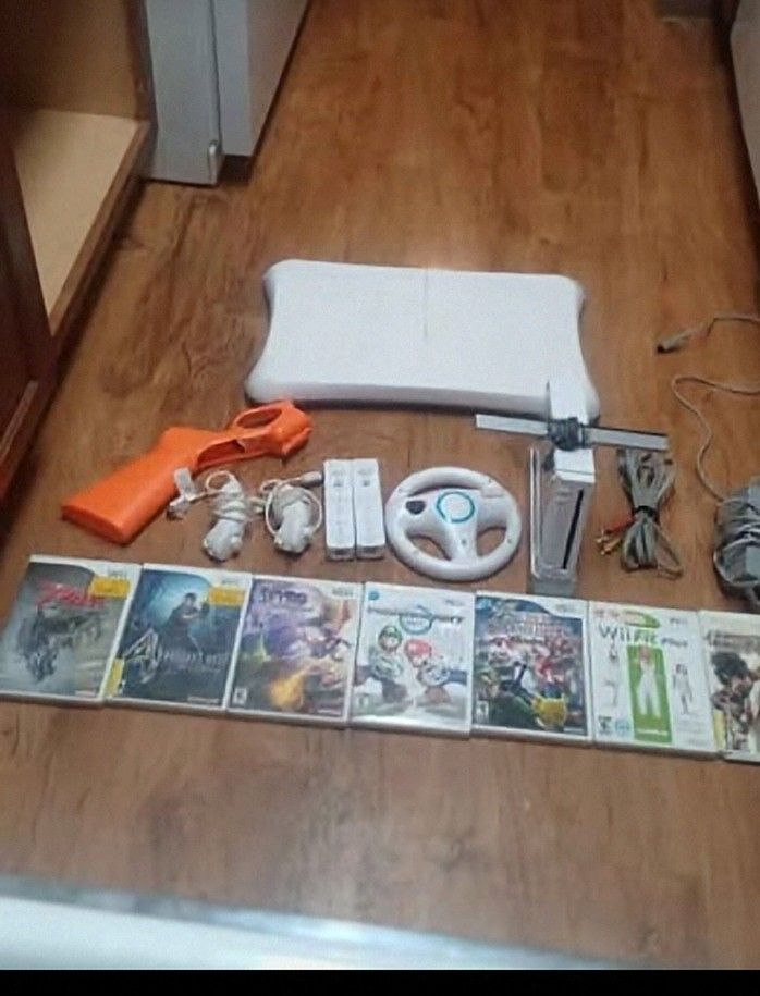 Wii With 7 Games Including Mario Kart And Accessories