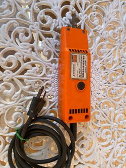 Grind-R-Guide chainsaw sharpener