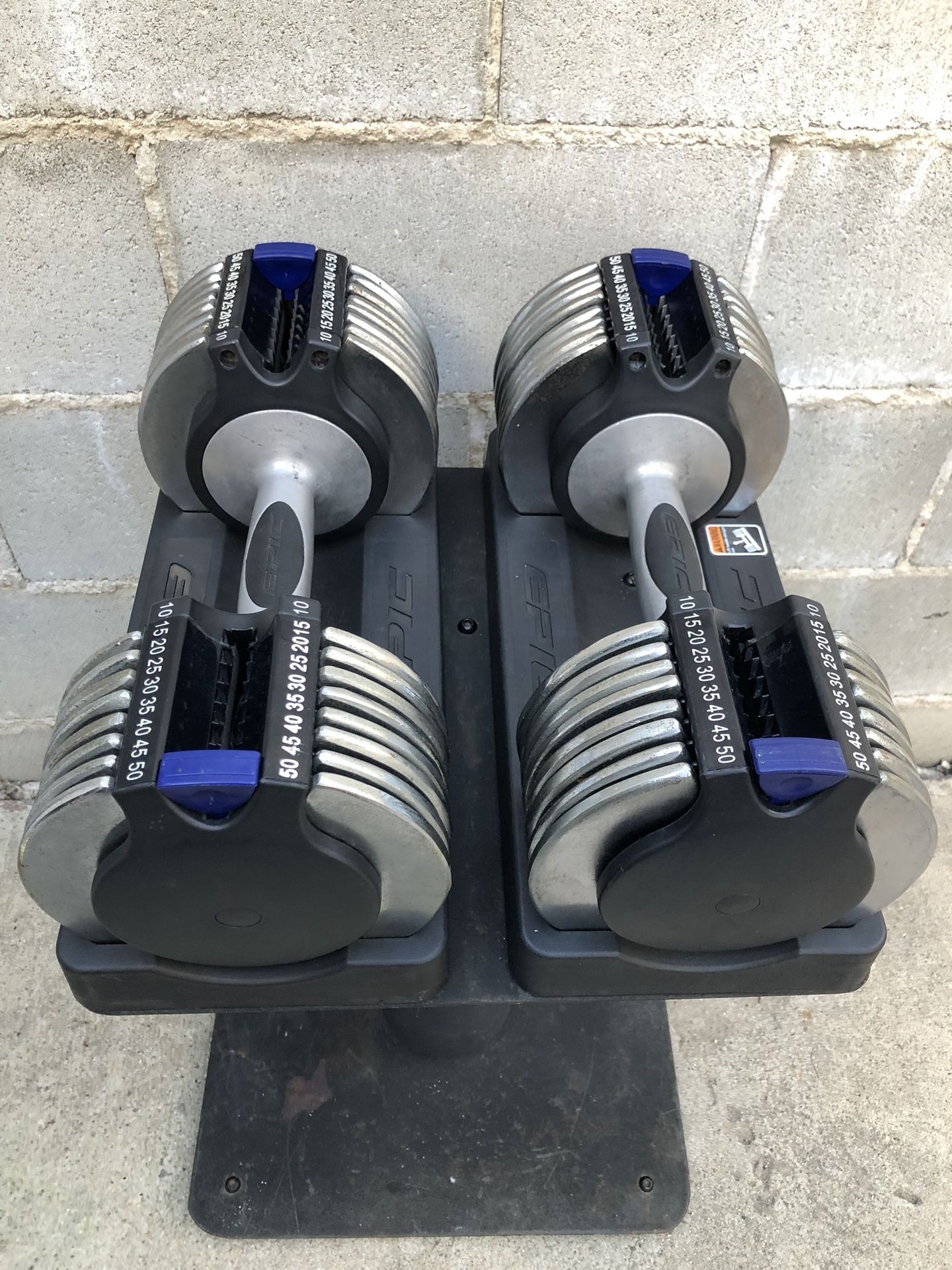 Epic Power Set 100 Adjustable Dumbbells With Stand In Solid Condition Ready To Use. Each dumbbell adjust from 10-50lbs . $250 Firm
