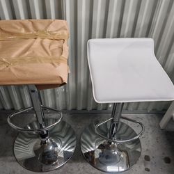 2 white bar stools