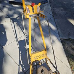 7 blade McLane lawn mower