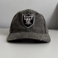 The Vintage 90's Oakland Raiders Hat Stonewashed Denim by Universal
