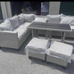 Brand new patio outdoor wicker sectional dining set I have  it new in the box 