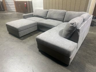 Gray Sectional + Ottoman