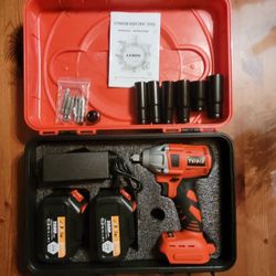 Brand New TOHE IMPACT WRENCH KIT WITH TWO BATTERIES 