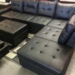 Brand new black faux leather Sectional Sofa with storage chaise