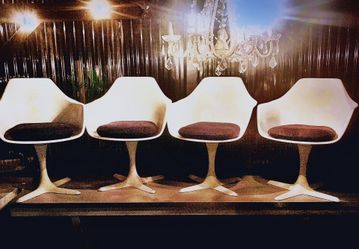 Four Burke Tulip Swivel Chairs