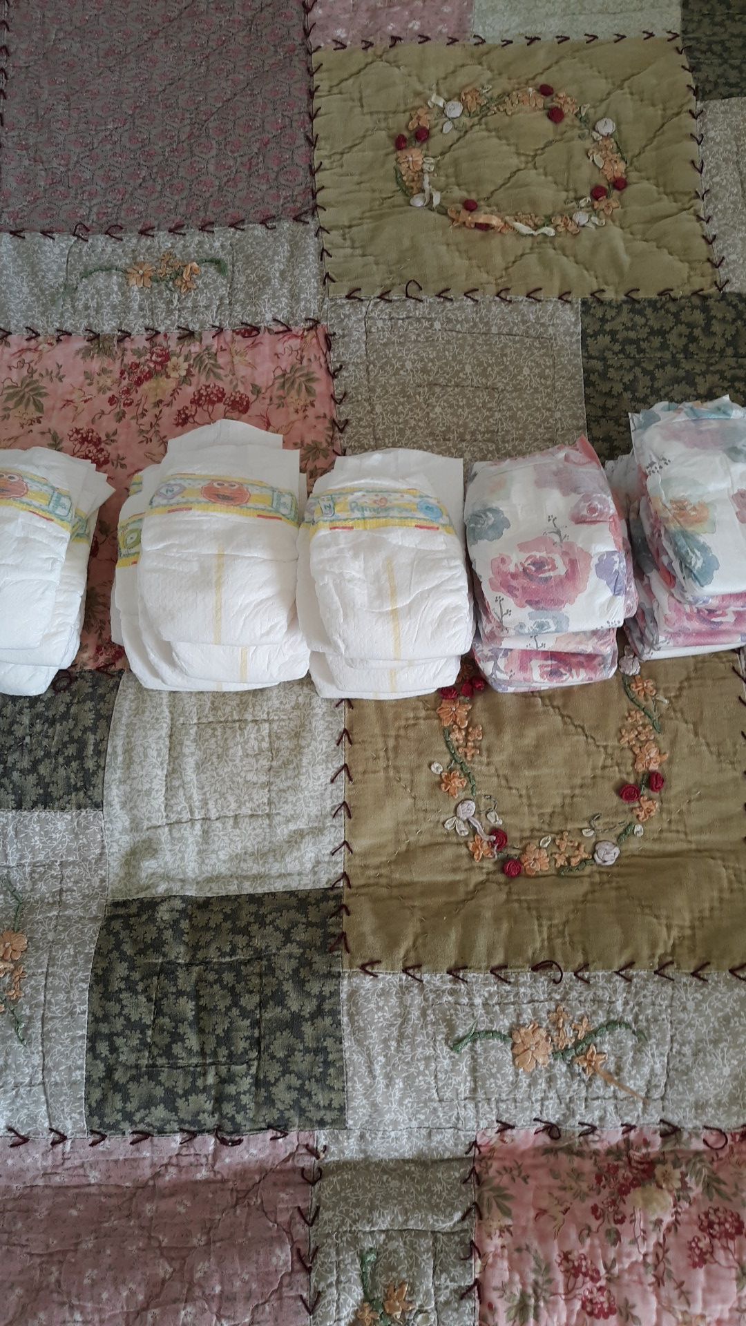 30 Newborn Pampers and Honest Diapers