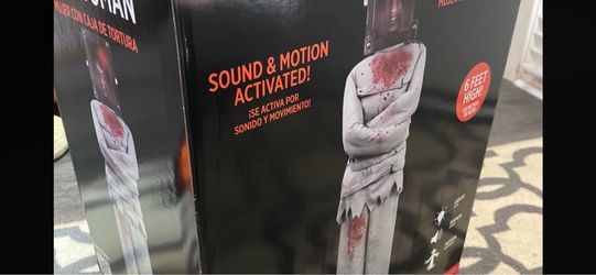 Party city, torture box, woman, and animatronic