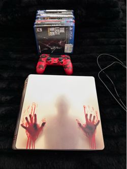PlayStation 4 w/ games controller and charger stand