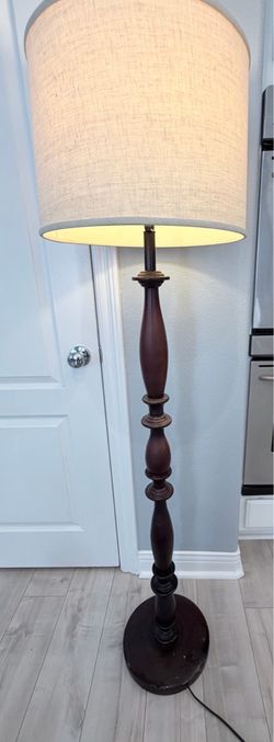 Brown floor lamp. Sturdy.
