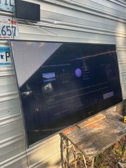 57” Samsung smart tv. Has thin line on left side