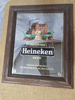 Vintage Heineken beer advertisement mirror.