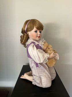 Porcelain doll by Knowles