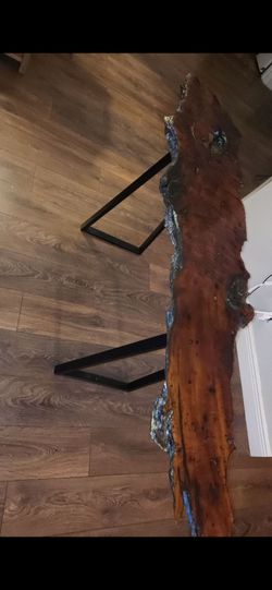 Wood.  One of a kind table
