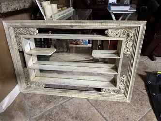 Framed Mirror With Small Shelves