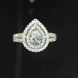 Elegant White Gold Pear Cut Engagement Ring Eye Catching Unique