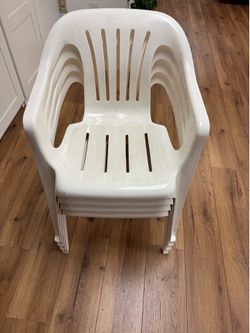4 White plastic chair for backyard and Patio