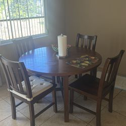 Good quality wood table and chairs
