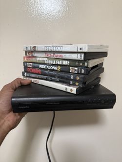 DVD PLAYER WITH  7 movies 