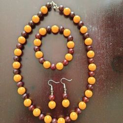 Set Of Necklace, earrings, And Bracelet.