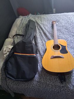 First Act Guitar with gig bag