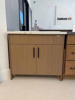 Frameless Base Cabinet with Light Wood Finish