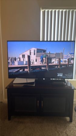 Office desk & chair.  Plus Television