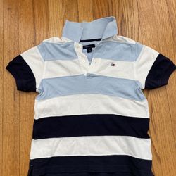 Tommy Hilfiger Kids Polo Shirt Size 4 – Good Condition  Tommy Hilfiger children's Polo shirt, size 4. Classic blue and white stripes design, comfortab