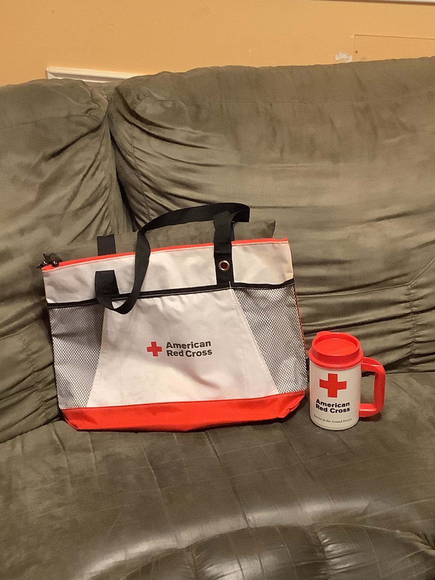 Red Cross Bag And A Tumbler