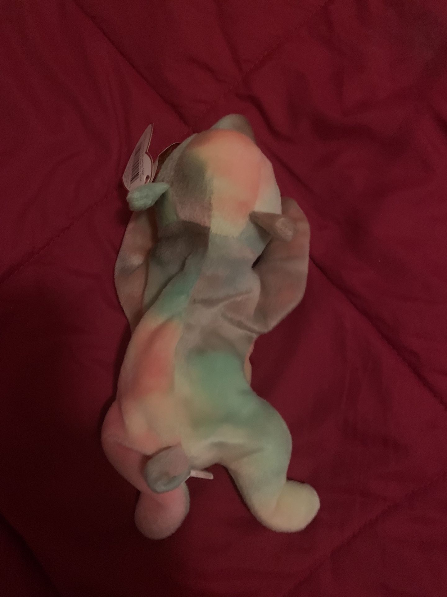 One Ty beanie baby rainbow plush toy