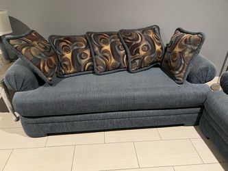 Sleeper couch and love seat.