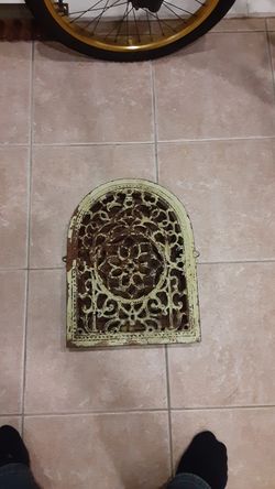 Antique heat register very ornate