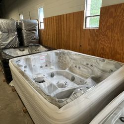 New Floor Model- artesian Spa- Retails $20,000