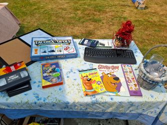 Scoobie doo stickers, book, tacoma monopoly  light up glasses foot rest and more