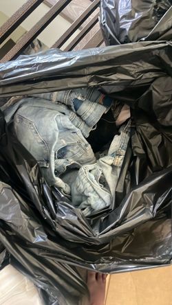 Bag of denim shorts and jeans