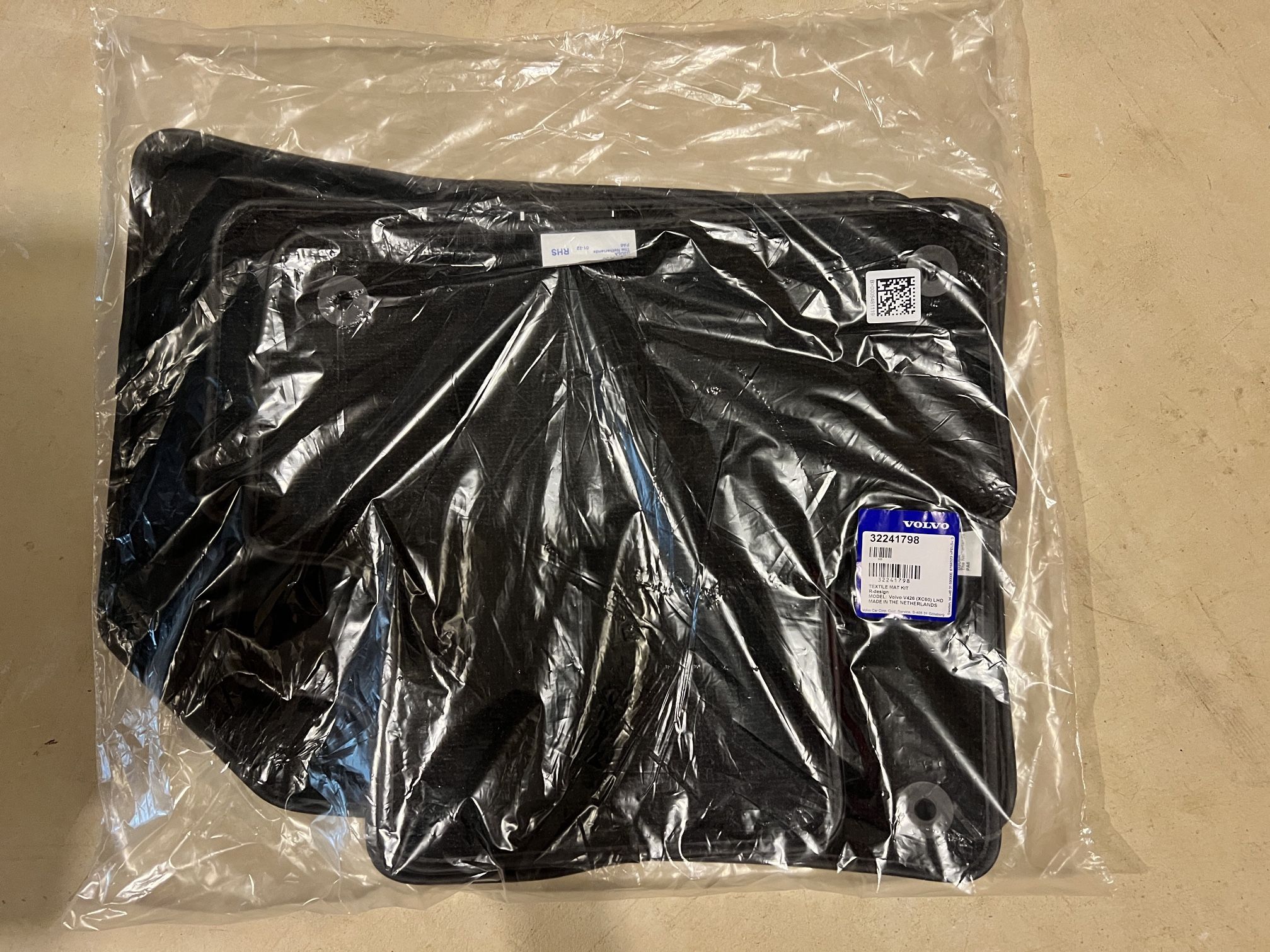 Brand new genuine 2018-2026 Volvo XC60 carpeted floor mat set.