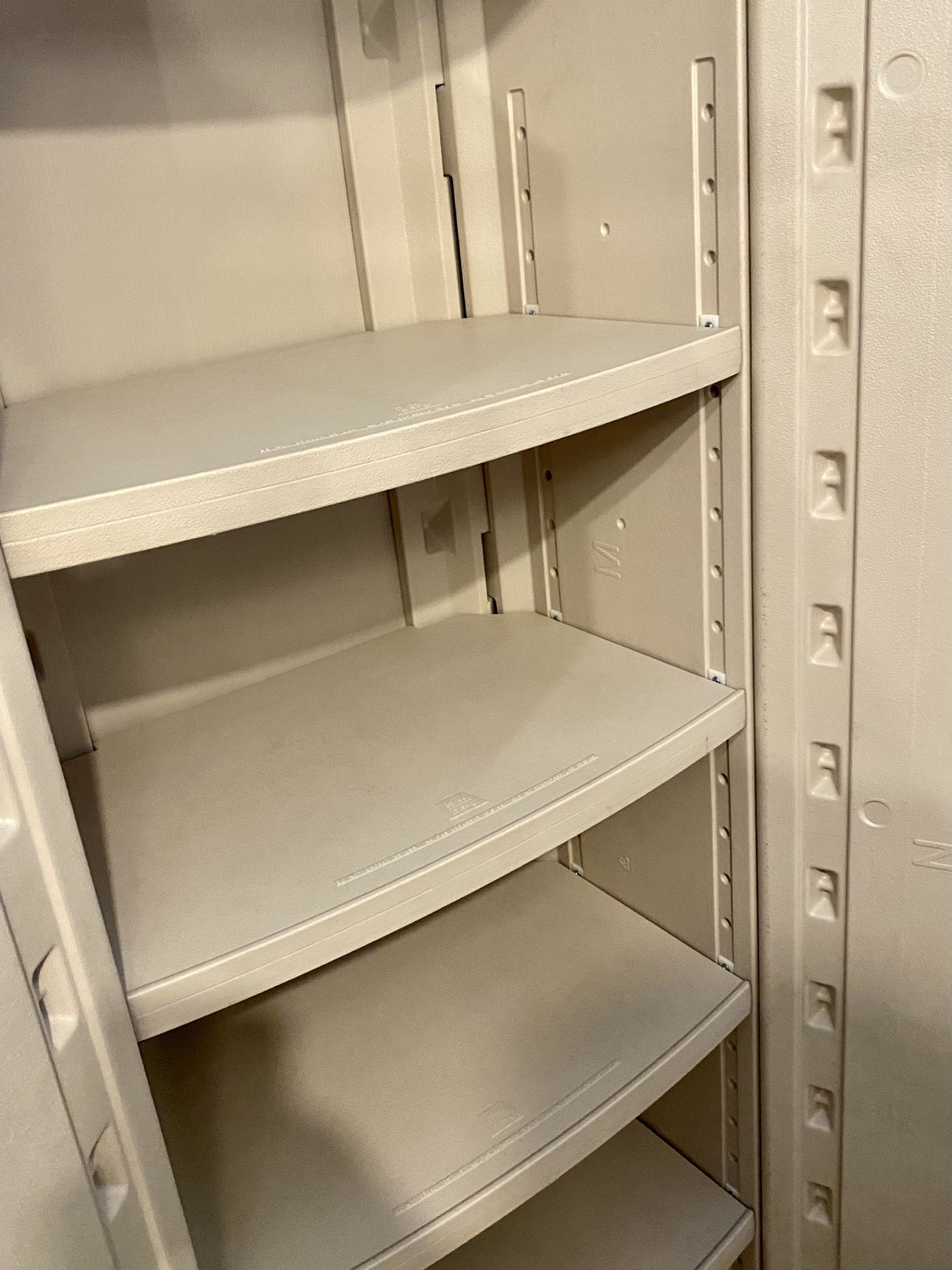 Sold at Auction: rubbermaid storage cabinet