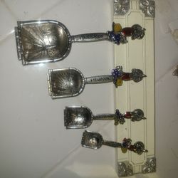 Wine themed measuring spoons and wall holder