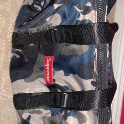 supreme camo duffle