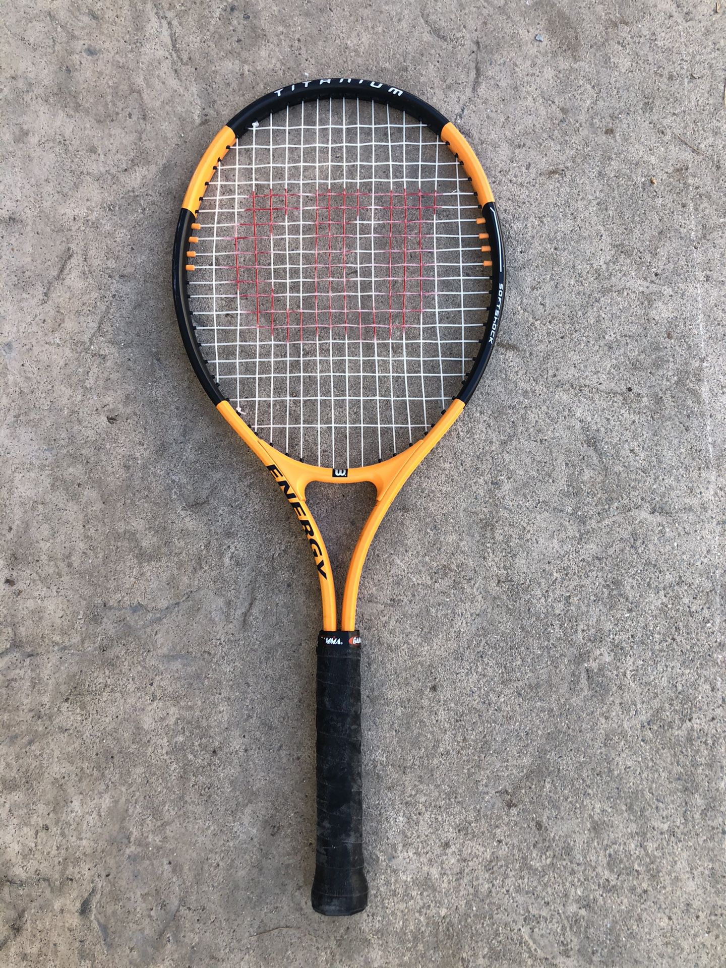Wilson tennis racket orange black titanium energy grip 4 3/8