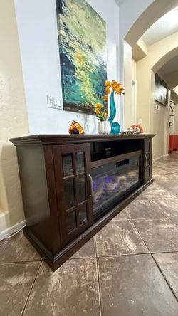 Beautiful Tresanti fireplace /tv stand with cooling and heater in excellent condition