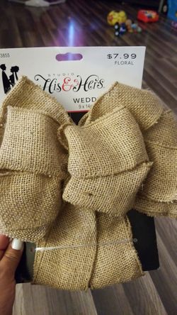 Brand new. Never opened. Burlap bow