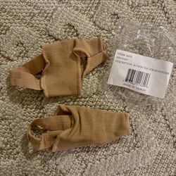 New bunion toe straightener. Designed to help align the big toe and reduce discomfort from bunions. Features a fabric sleeve and a
