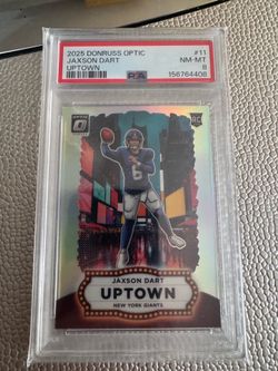 Jaxson Dart Uptown PSA 8 $500