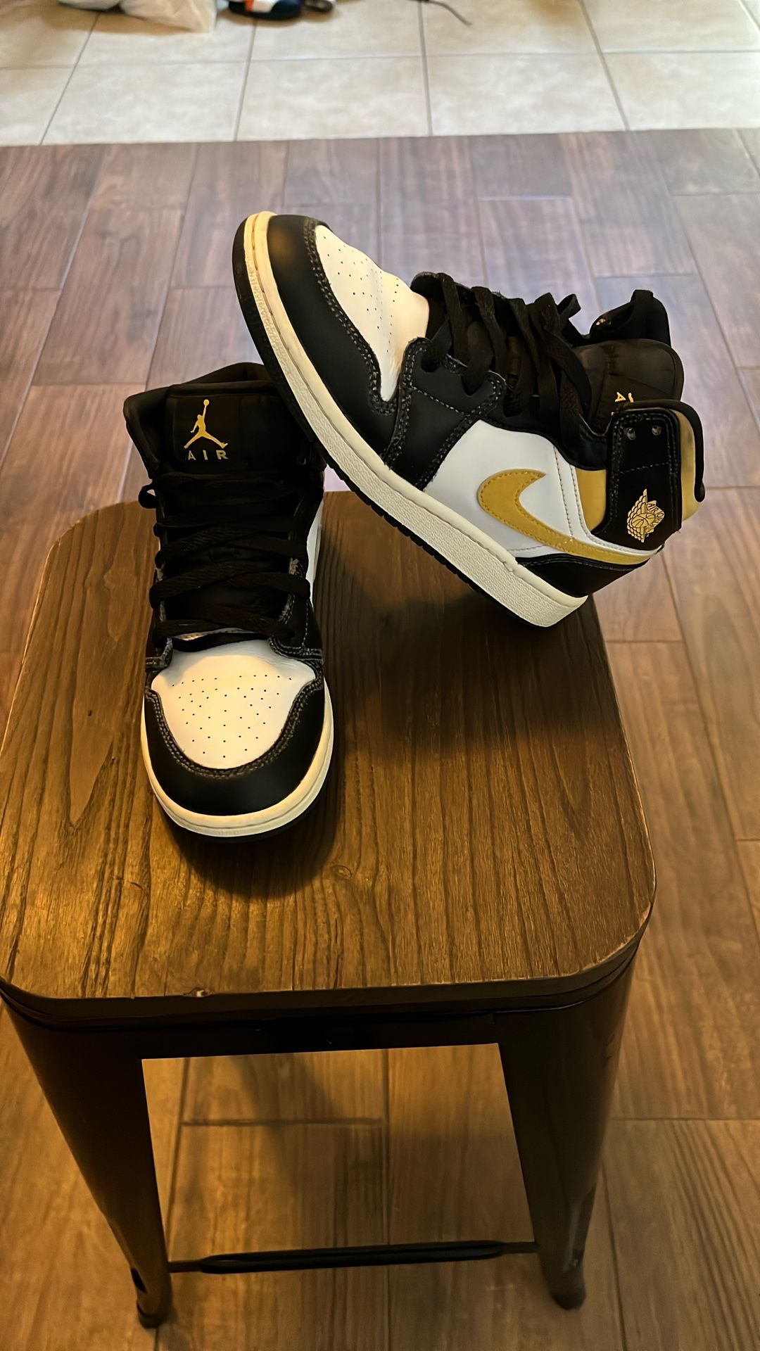 Nike Air Jordan’s Color Black Gold And White