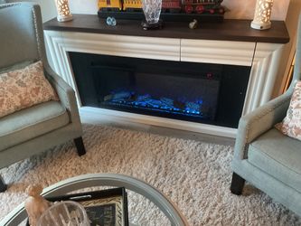 6 foot wide electric fireplace with built-in heating unit and three hidden drawers different adjustments to change the flame color heat level and he h